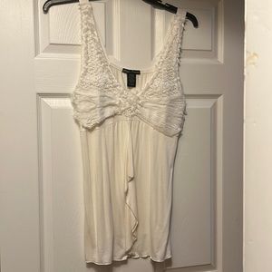 Women’s medium cream colored top. No tags but never worn